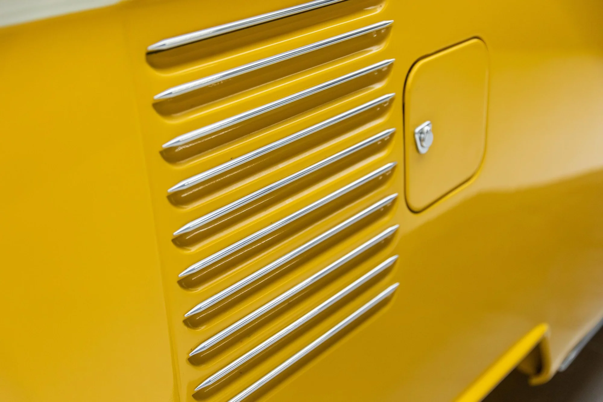 Bright Yellow Classic Car Side Vents - classic car, vintage automobile, bright yellow, side vents, chrome trim, classic-car, vintage, yellow