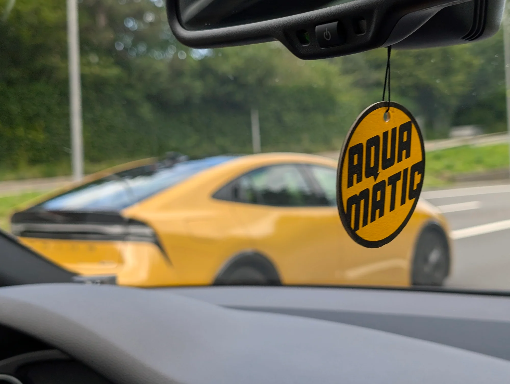 Golden Hybrid - yellow sports car, aqua matic air freshener, rearview mirror, dashboard view, bright yellow, yellow, sports car, interior shot